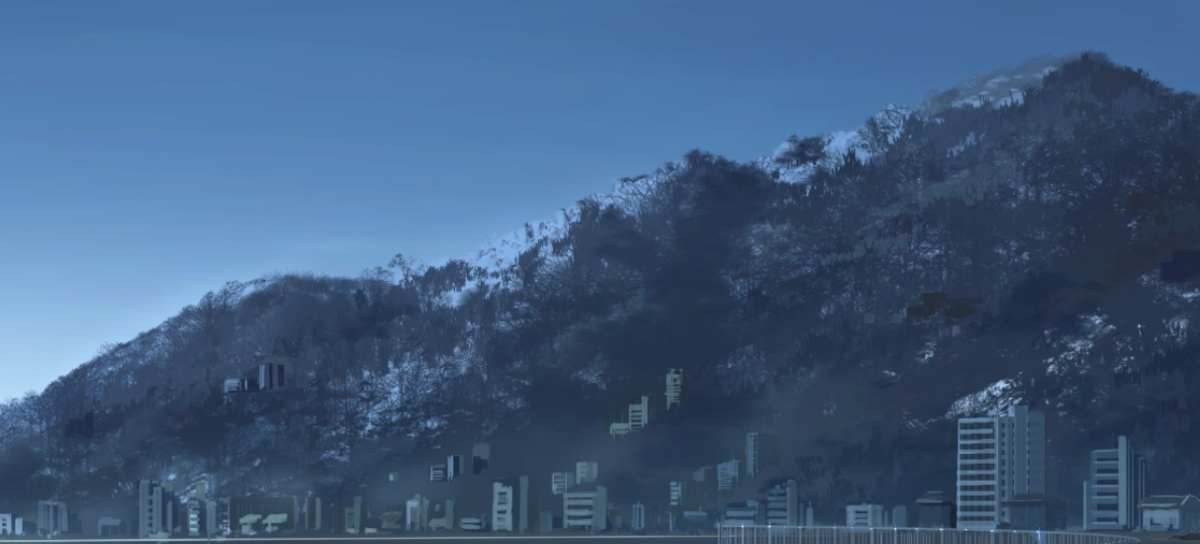 上の方にだけ雪が積もる山